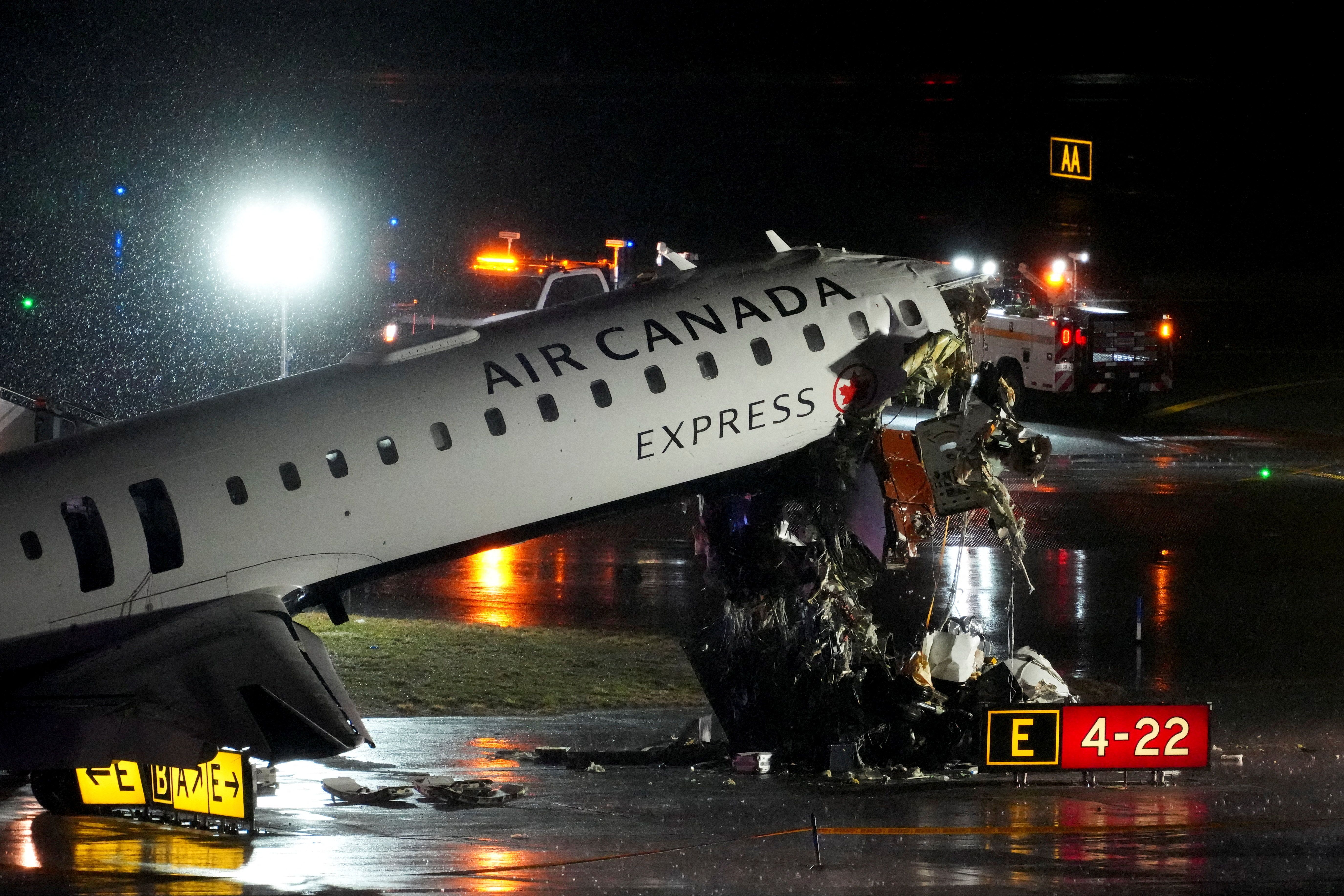 Air Canada Express Plane Collides with Fire Truck at LaGuardia, Killing Both Pilots
